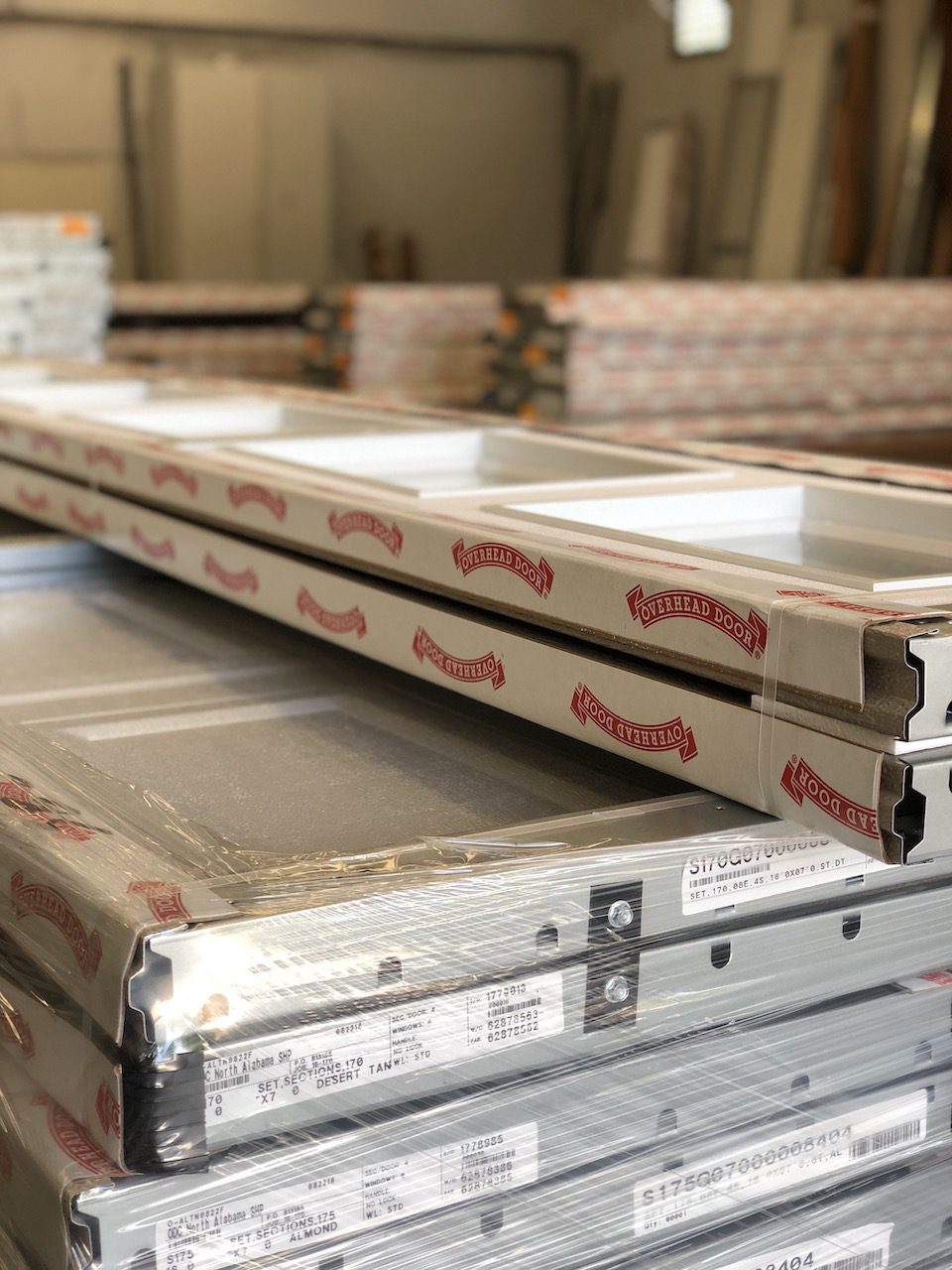 Garage Doors sitting in warehouse at Overhead Door Company of Huntsville™
