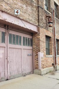 Old Pink Garage Door showing a little of the history of the Original Overhead Door Company doors.