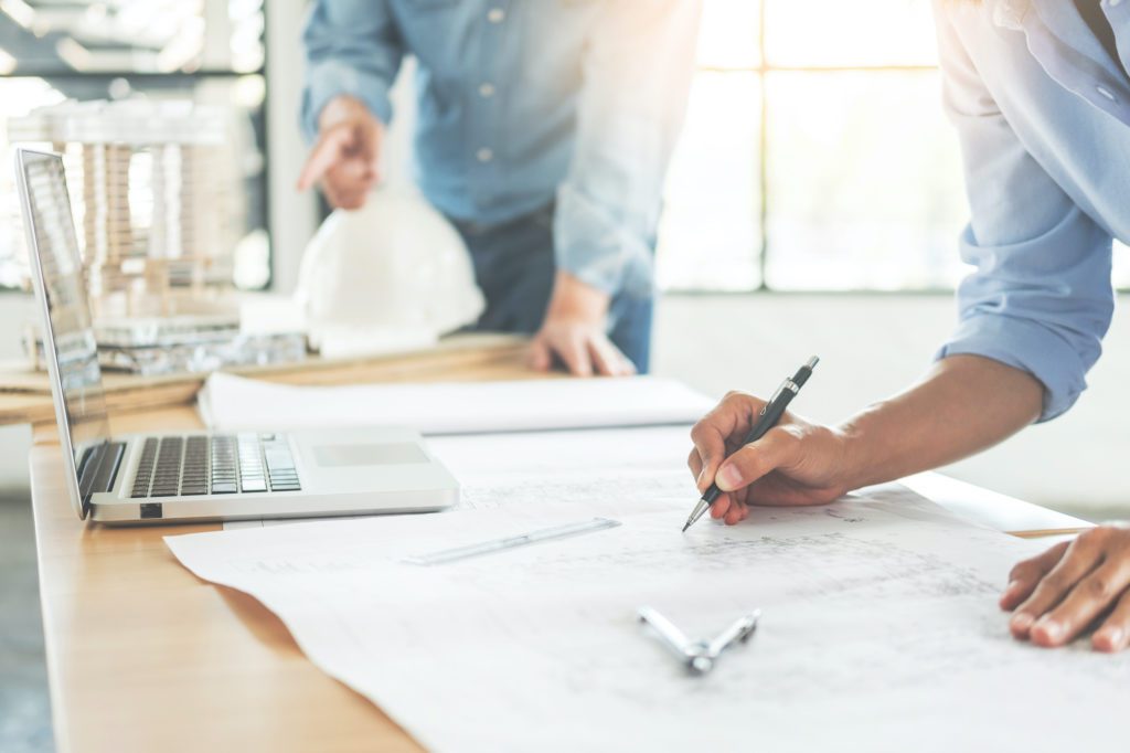 Commercial Service working on an estimate for a commercial job repair