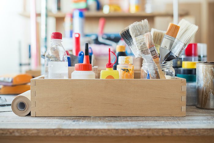 Painting supplies safely left in a garage. Owner of home followed the 20 tips for keeping your garage cooler. 