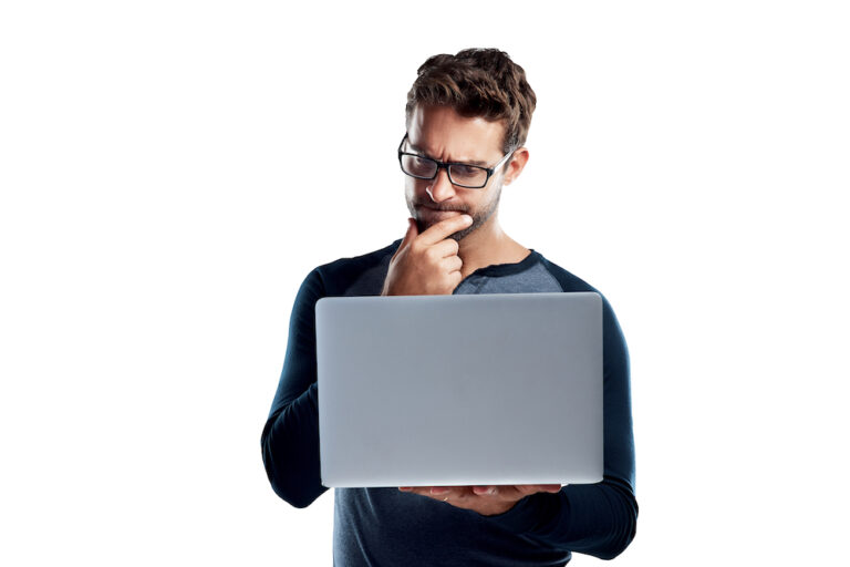 A confused garage door customer looking at his computer trying to decide whether to reset his garage door settings for his limit switch